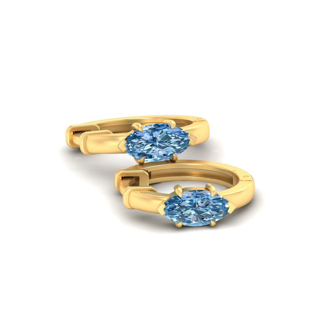 1-carat-blue-lab-grown-diamond-marquise-cut-huggie-hoop-earrings-in-yellow-gold-fdear11842mqgvblueangle5-1.00ct-nl-yg.jpg?v=1792994449