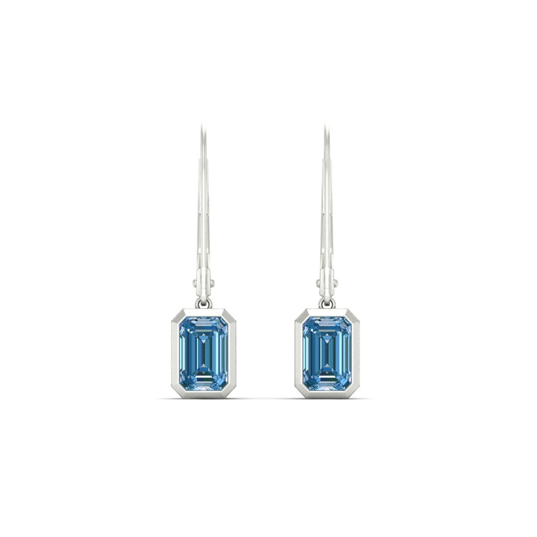 1-carat-emerald-cut-bezel-vivid-blue-leverback-earrings-in-white-gold-fdear11736emgvblueangle2-1.00ct-nl-wg.jpg