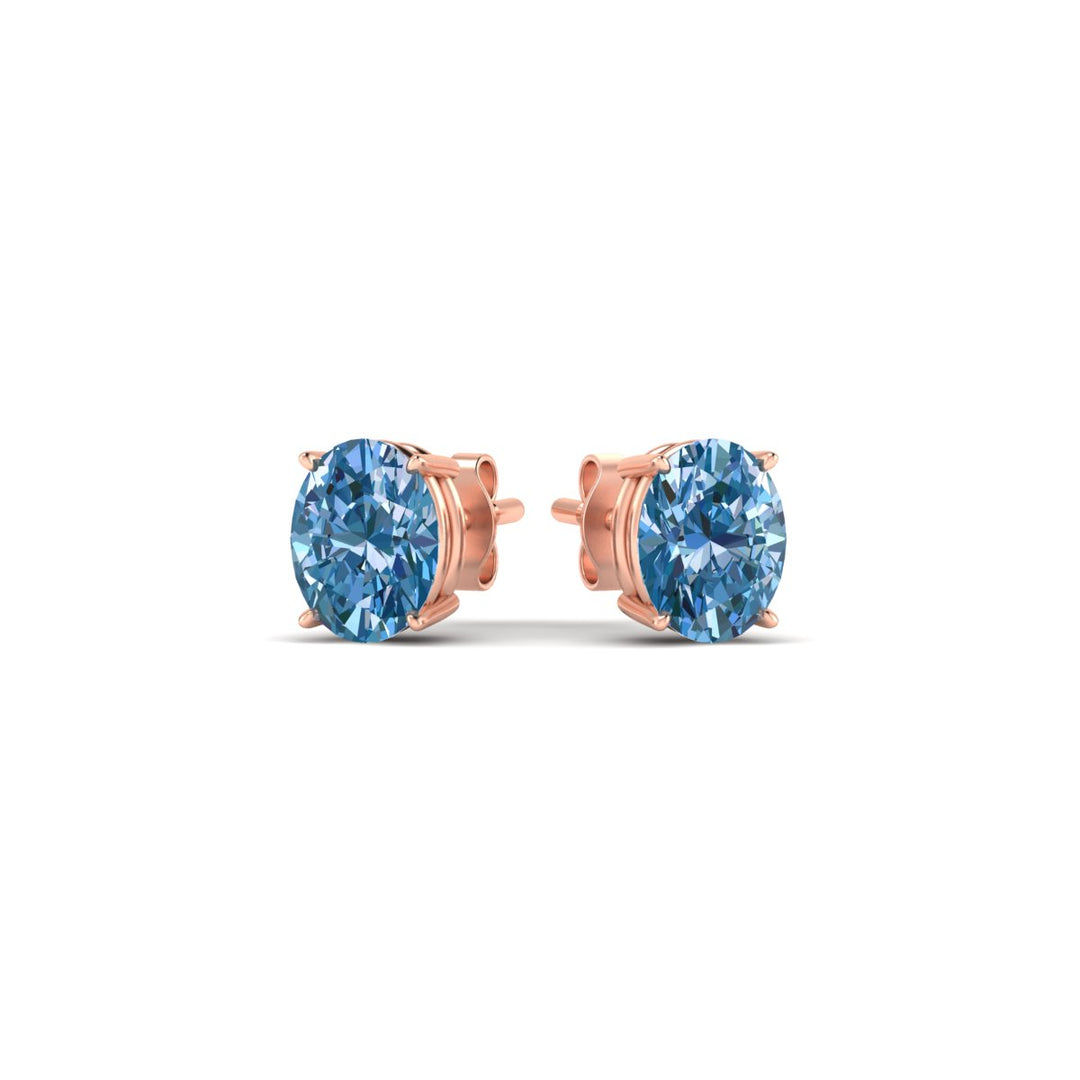 1-carat-oval-cut-vivid-blue-diamond-stud-earrings-in-rose-gold-fdear10411ovgvblueangle3-1.00ct-nl-rg.jpg