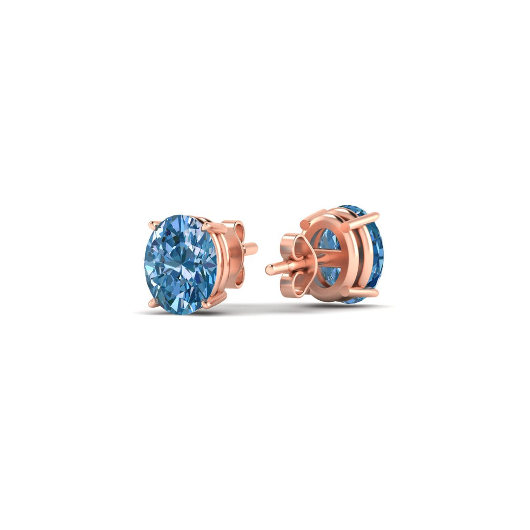 1-carat-oval-cut-vivid-blue-diamond-stud-earrings-in-rose-gold-fdear10411ovgvblueangle4-1.00ct-nl-rg.jpg