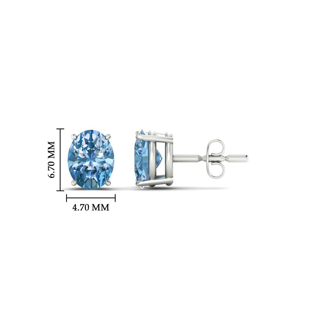 1-carat-oval-cut-vivid-blue-diamond-stud-earrings-in-white-gold-fdear10411ovgvblueangle2-1.00ct-nl-wg-hw.jpg