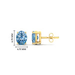 Load image into Gallery viewer, 1-carat-oval-cut-vivid-blue-diamond-stud-earrings-in-yellow-gold-fdear10411ovgvblueangle2-1.00ct-nl-yg-hw.jpg