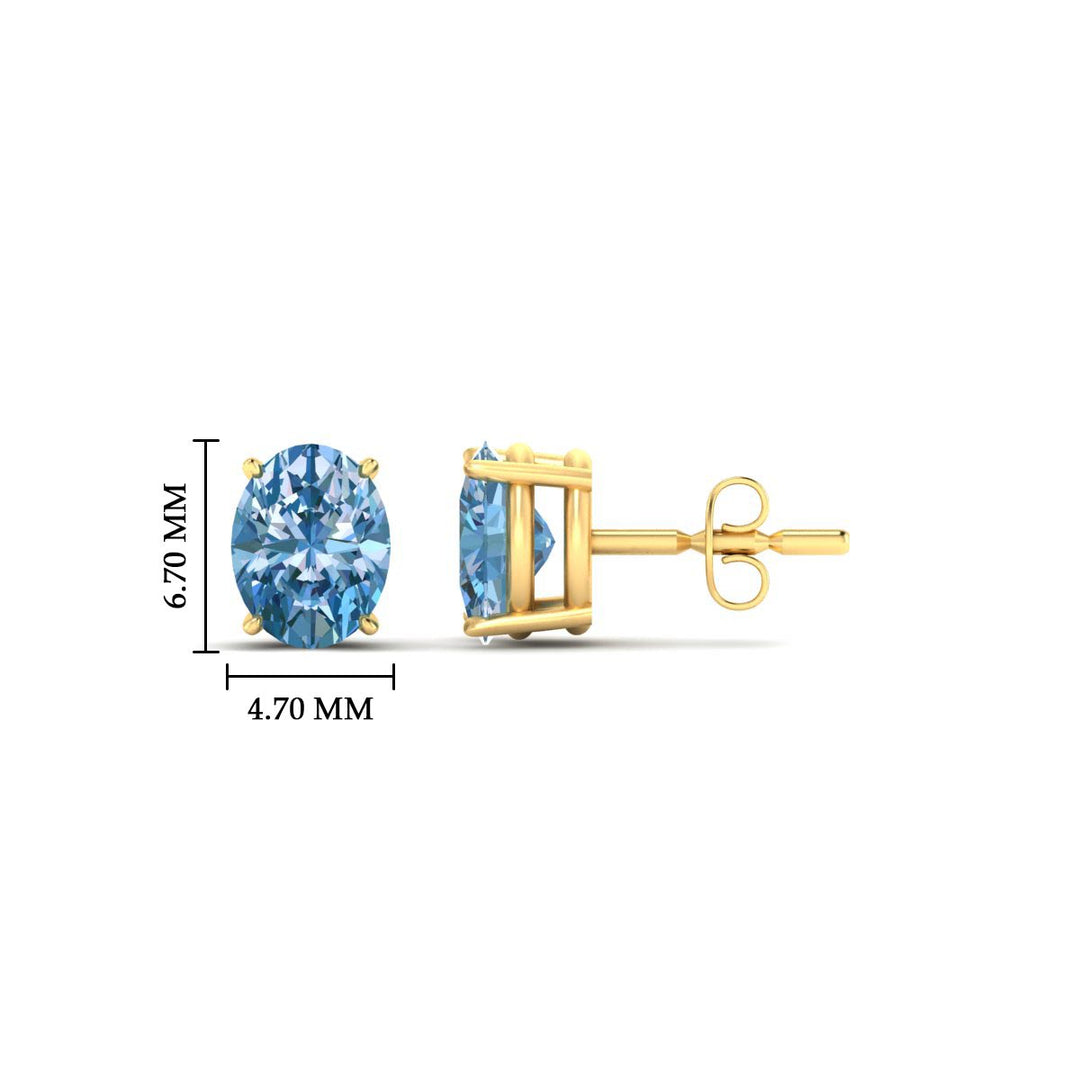 1-carat-oval-cut-vivid-blue-diamond-stud-earrings-in-yellow-gold-fdear10411ovgvblueangle2-1.00ct-nl-yg-hw.jpg