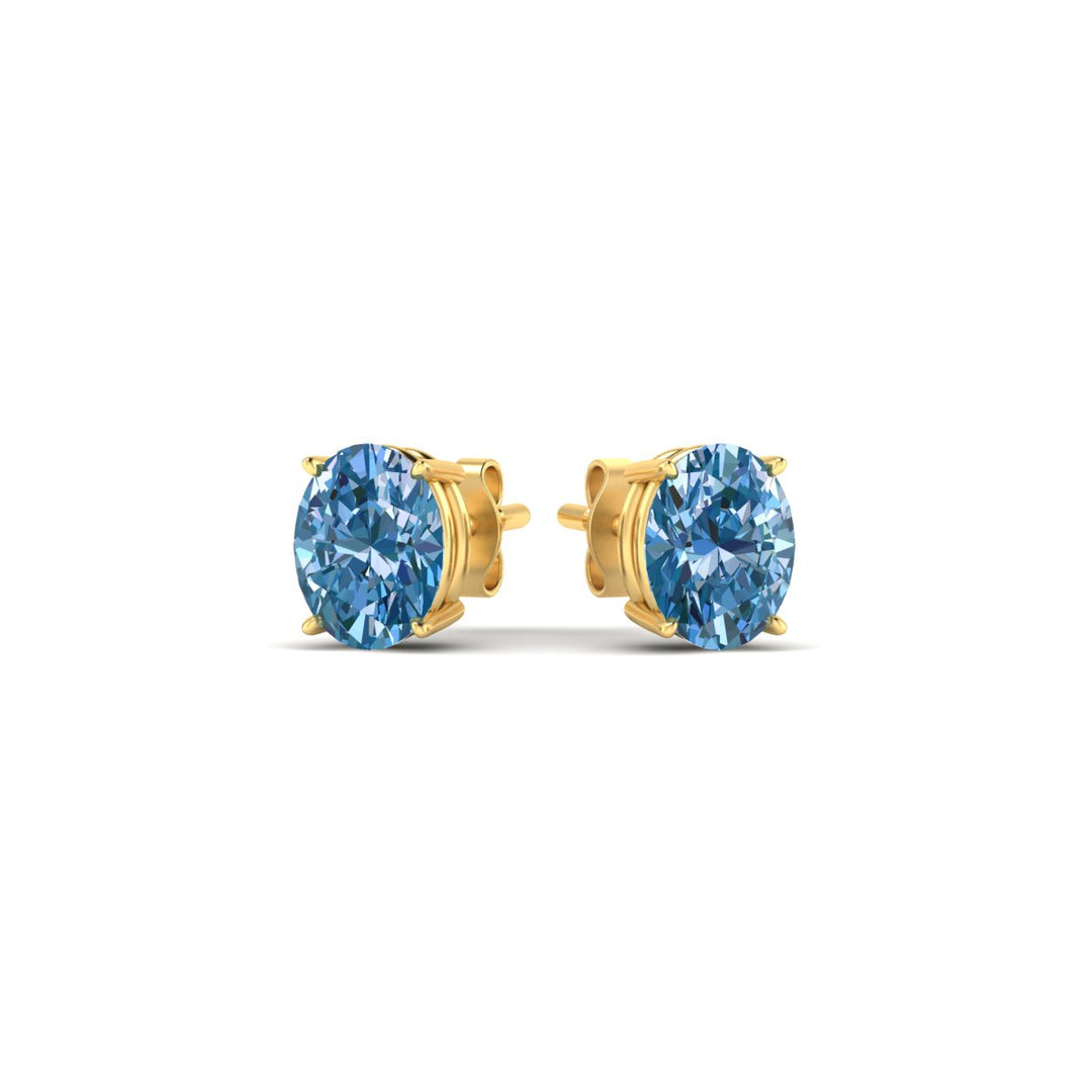 1-carat-oval-cut-vivid-blue-diamond-stud-earrings-in-yellow-gold-fdear10411ovgvblueangle3-1.00ct-nl-yg.jpg