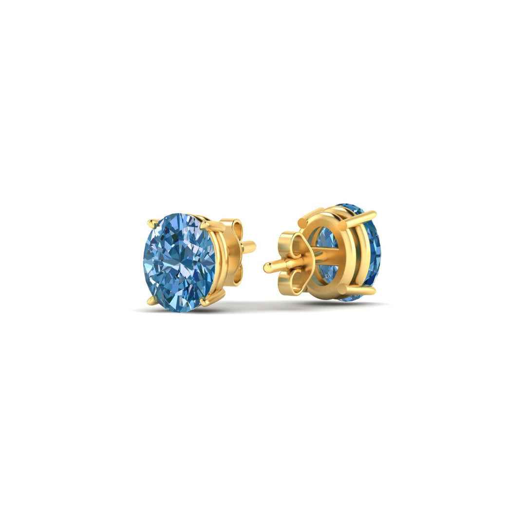 1-carat-oval-cut-vivid-blue-diamond-stud-earrings-in-yellow-gold-fdear10411ovgvblueangle4-1.00ct-nl-yg.jpg