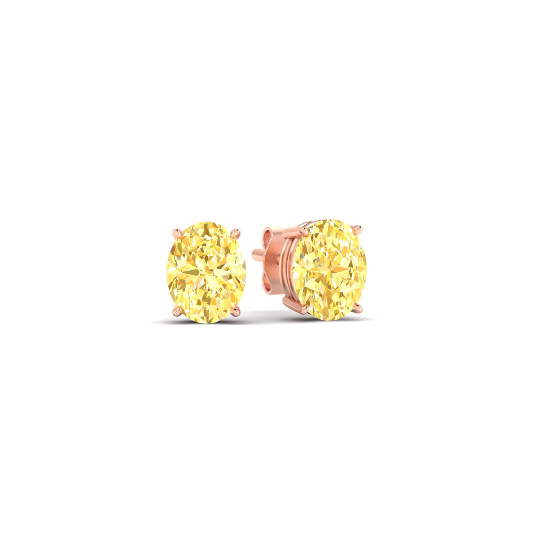 1-carat-oval-cut-vivid-yellow-diamond-stud-earrings-in-rose-gold-fdear10411ovgvyellowangle1-1.00ct-nl-rg.jpg