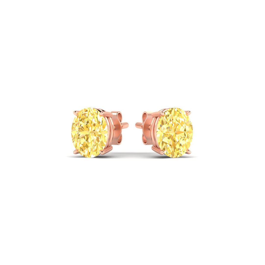 1-carat-oval-cut-vivid-yellow-diamond-stud-earrings-in-rose-gold-fdear10411ovgvyellowangle3-1.00ct-nl-rg.jpg