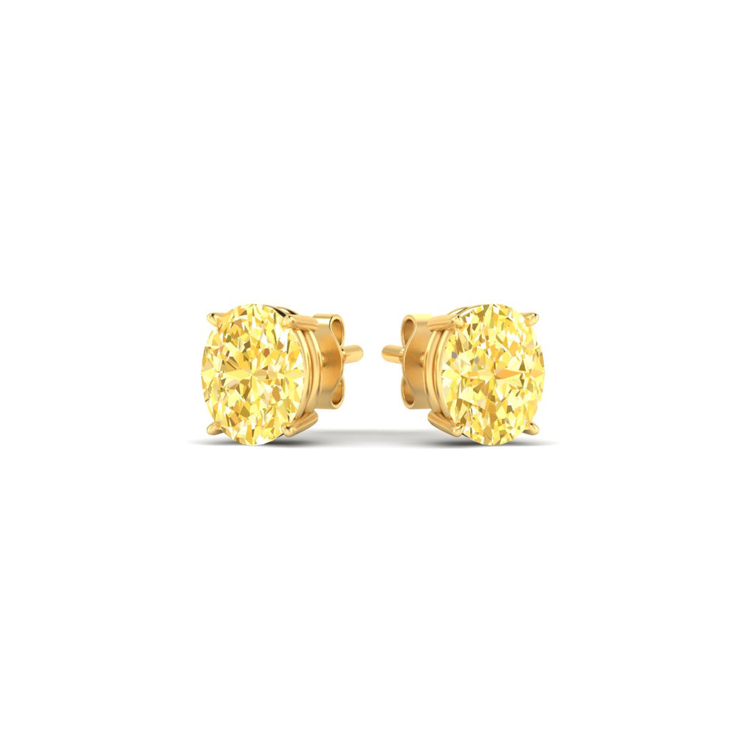 1-carat-oval-cut-vivid-yellow-diamond-stud-earrings-in-yellow-gold-fdear10411ovgvyellowangle3-1.00ct-nl-yg.jpg