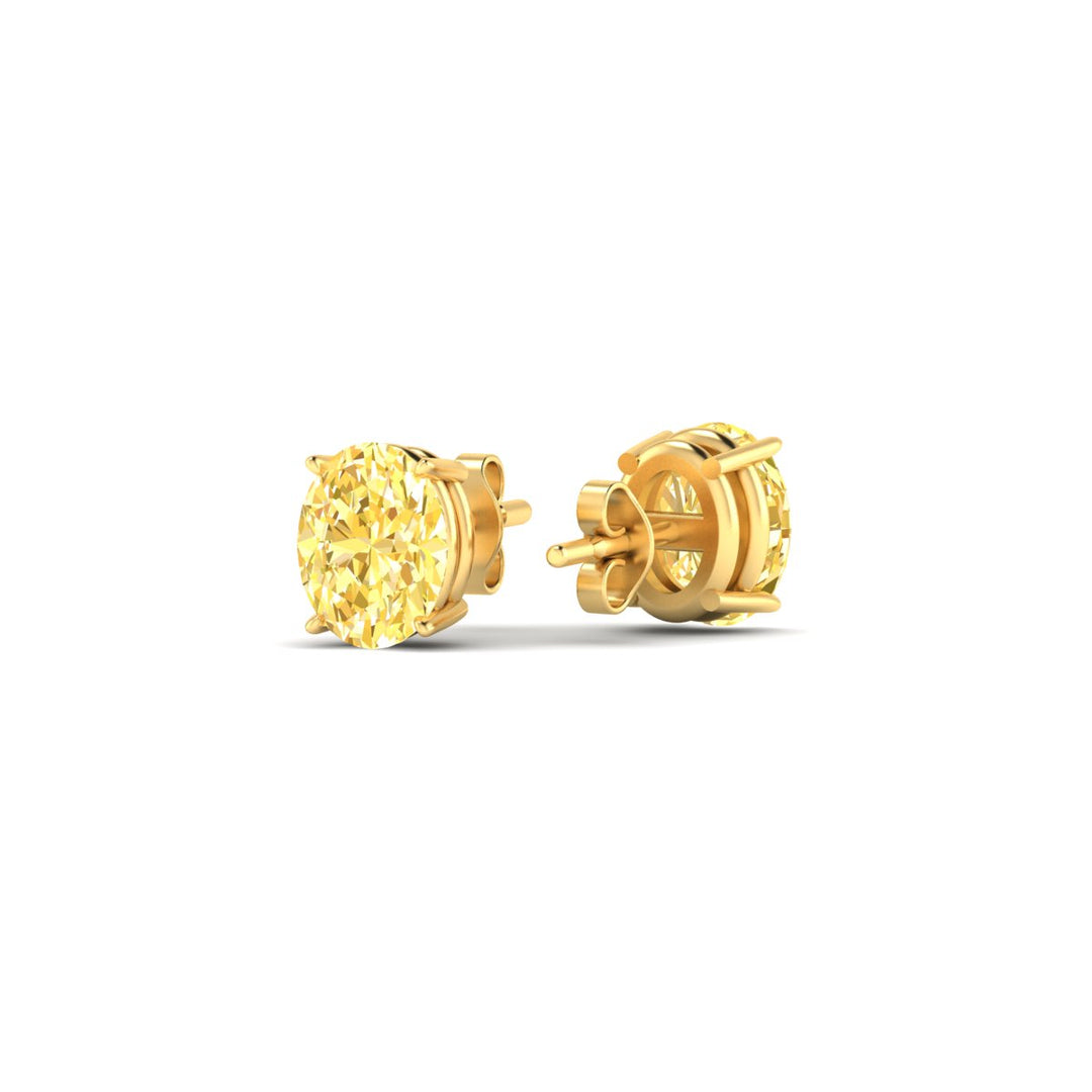 1-carat-oval-cut-vivid-yellow-diamond-stud-earrings-in-yellow-gold-fdear10411ovgvyellowangle4-1.00ct-nl-yg.jpg