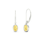 Load image into Gallery viewer, 1-carat-oval-shaped-bezel-vivid-yellow-leverback-earrings-in-white-gold-fdear11736ovgvyellowangle4-1.00ct-nl-wg.jpg