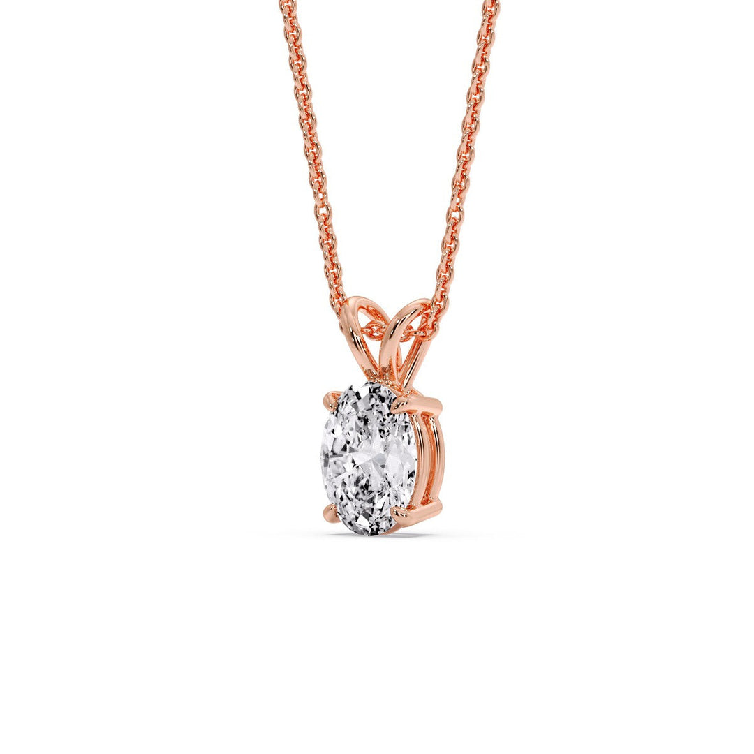 https://www.fascinatingdiamonds.com/cdn/shop/files/1-ct-oval-single-diamond-pendant-in-rose-gold-FDPD8469ANGLE2-OV-1.00-RG_1200X1200.jpg?v=1758258952
