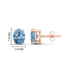 Load image into Gallery viewer, 2-carat-oval-cut-vivid-blue-diamond-stud-earrings-in-rose-gold-fdear10411ovgvblueangle2-2.00ct-nl-rg-hw.jpg