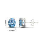 Load image into Gallery viewer, 2-carat-oval-cut-vivid-blue-diamond-stud-earrings-in-white-gold-fdear10411ovgvblueangle2-2.00ct-nl-wg-hw.jpg