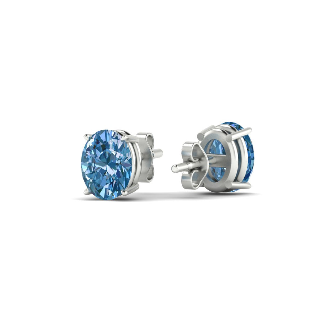 2-carat-oval-cut-vivid-blue-diamond-stud-earrings-in-white-gold-fdear10411ovgvblueangle4-2.00ct-nl-wg.jpg