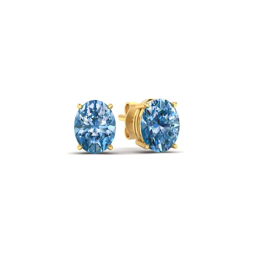 2-carat-oval-cut-vivid-blue-diamond-stud-earrings-in-yellow-gold-fdear10411ovgvblueangle1-2.00ct-nl-yg.jpg