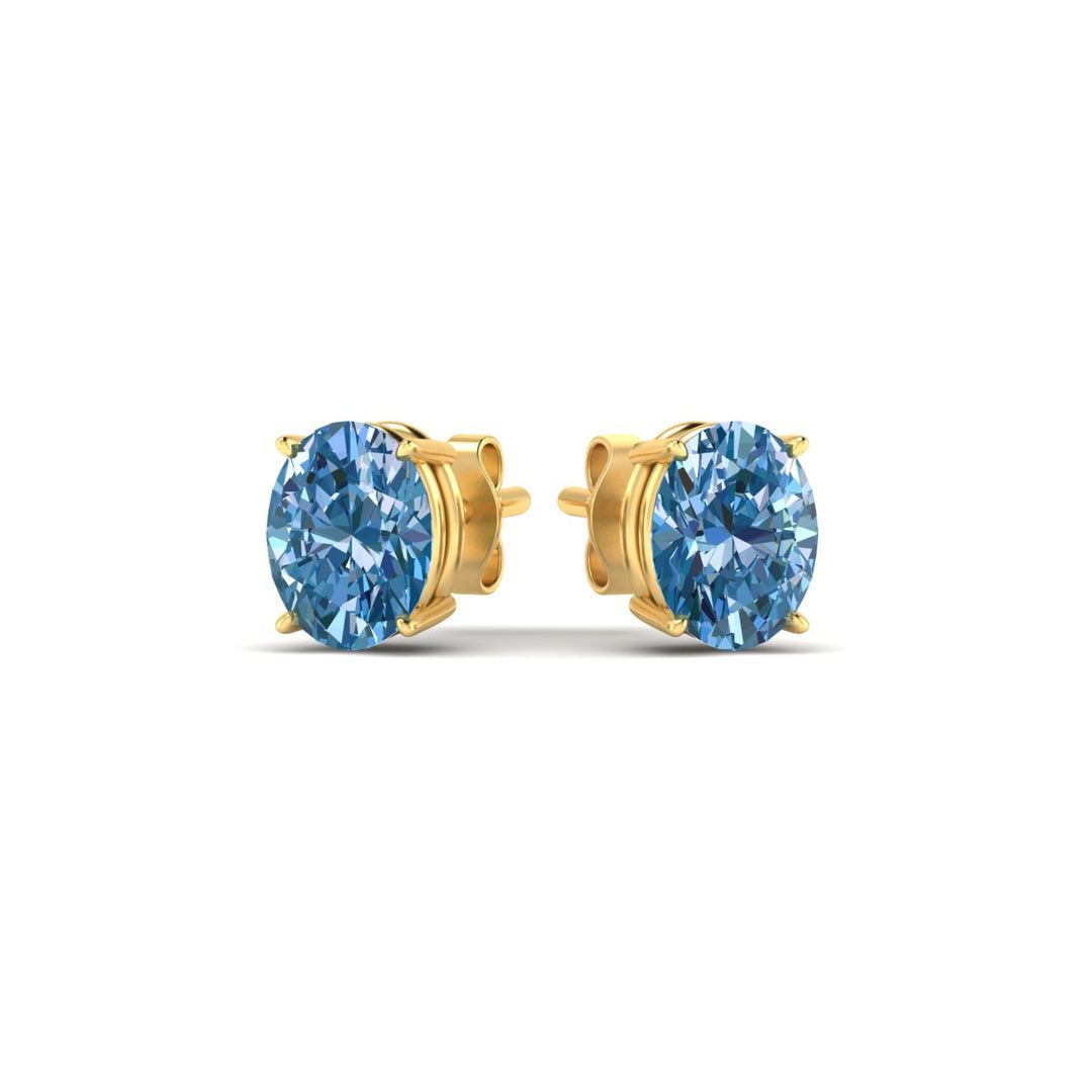 2-carat-oval-cut-vivid-blue-diamond-stud-earrings-in-yellow-gold-fdear10411ovgvblueangle3-2.00ct-nl-yg.jpg