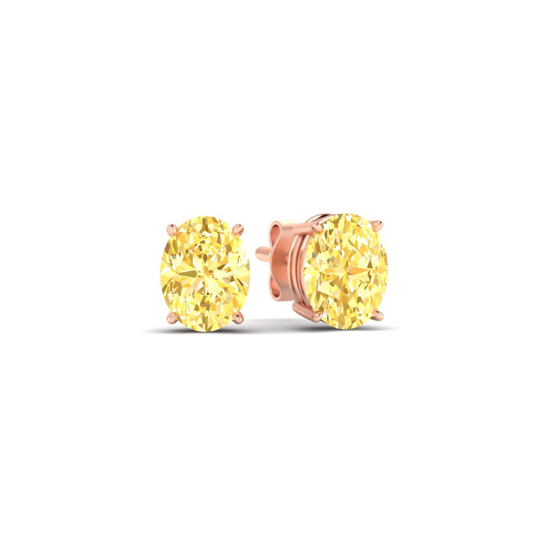 2-carat-oval-cut-vivid-yellow-diamond-stud-earrings-in-rose-gold-fdear10411ovgvyellowangle1-2.00ct-nl-rg.jpg