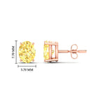 Load image into Gallery viewer, 2-carat-oval-cut-vivid-yellow-diamond-stud-earrings-in-rose-gold-fdear10411ovgvyellowangle2-2.00ct-nl-rg-hw.jpg