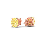 Load image into Gallery viewer, 2-carat-oval-cut-vivid-yellow-diamond-stud-earrings-in-rose-gold-fdear10411ovgvyellowangle4-2.00ct-nl-rg.jpg