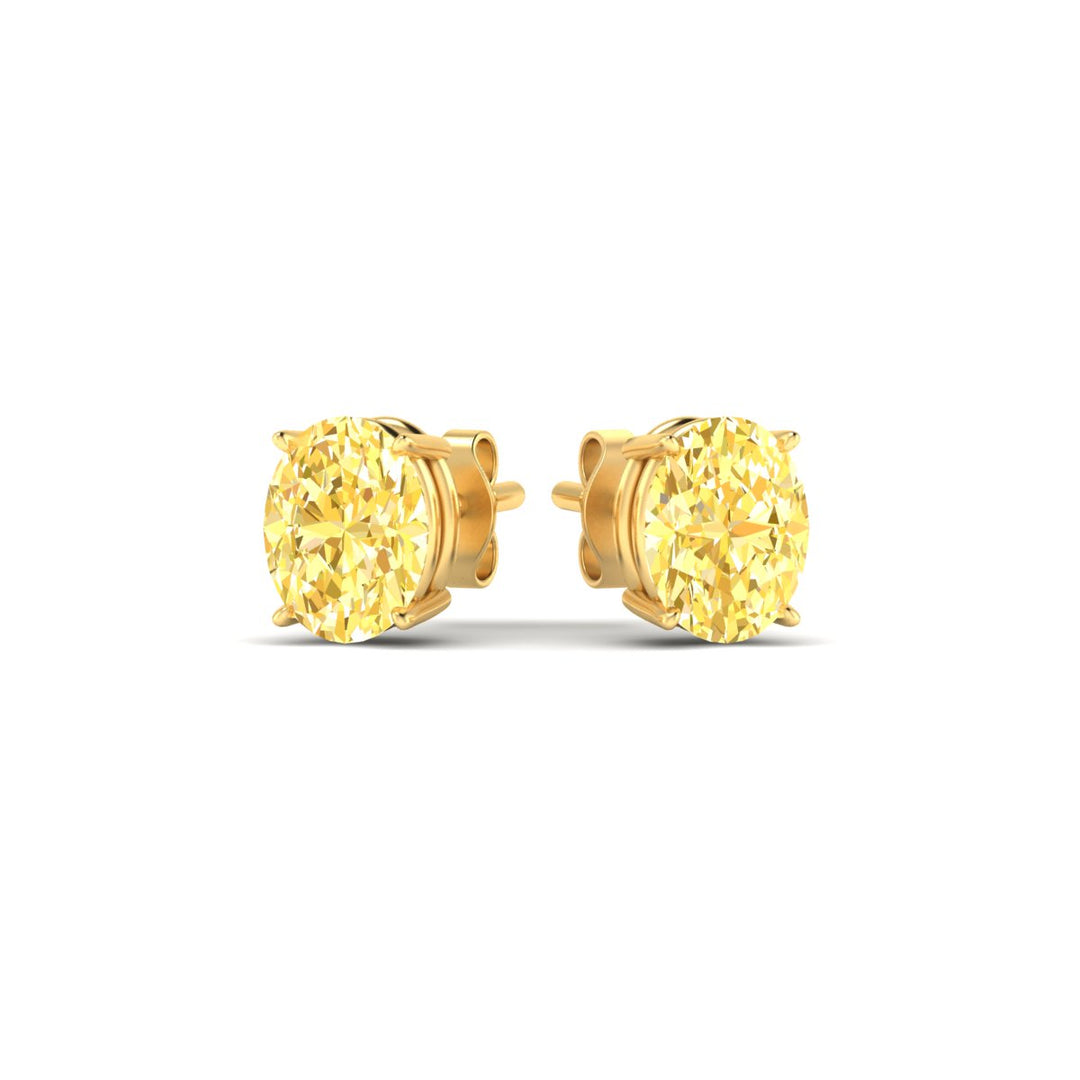 2-carat-oval-cut-vivid-yellow-diamond-stud-earrings-in-yellow-gold-fdear10411ovgvyellowangle3-2.00ct-nl-yg.jpg