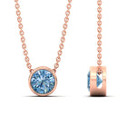 Load image into Gallery viewer, https://www.fascinatingdiamonds.com/cdn/shop/files/2-ct-fancy-lab-grown-round-vived-blue-bezel-stone-pendant-in-rose-gold-fdpd10538rogvblueangle3-2.00ct-nl-rg_480x480.jpg?v=1786098139