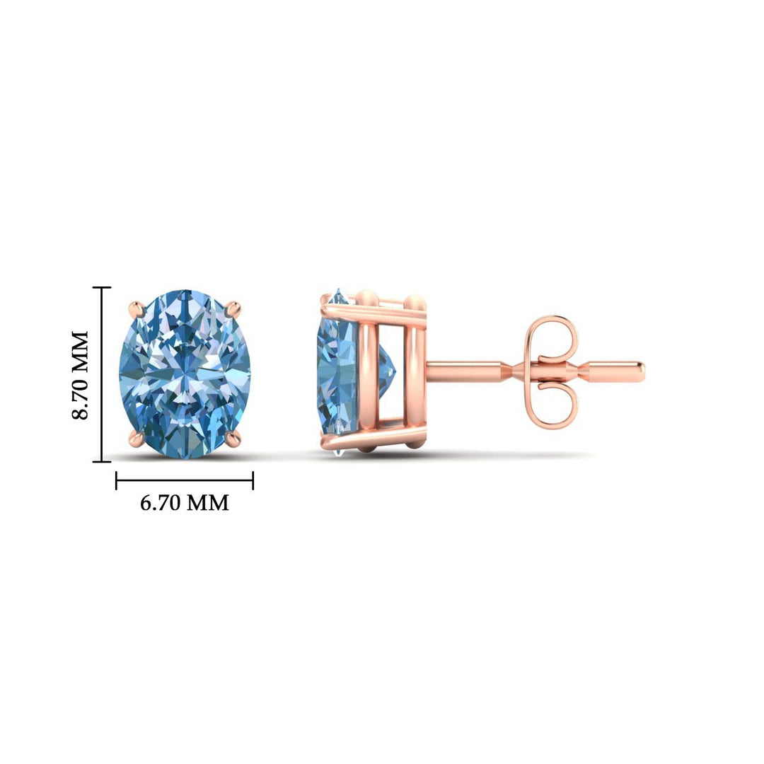 3-carat-oval-cut-vivid-blue-diamond-stud-earrings-in-rose-gold-fdear10411ovgvblueangle2-3.00ct-nl-rg-hw.jpg