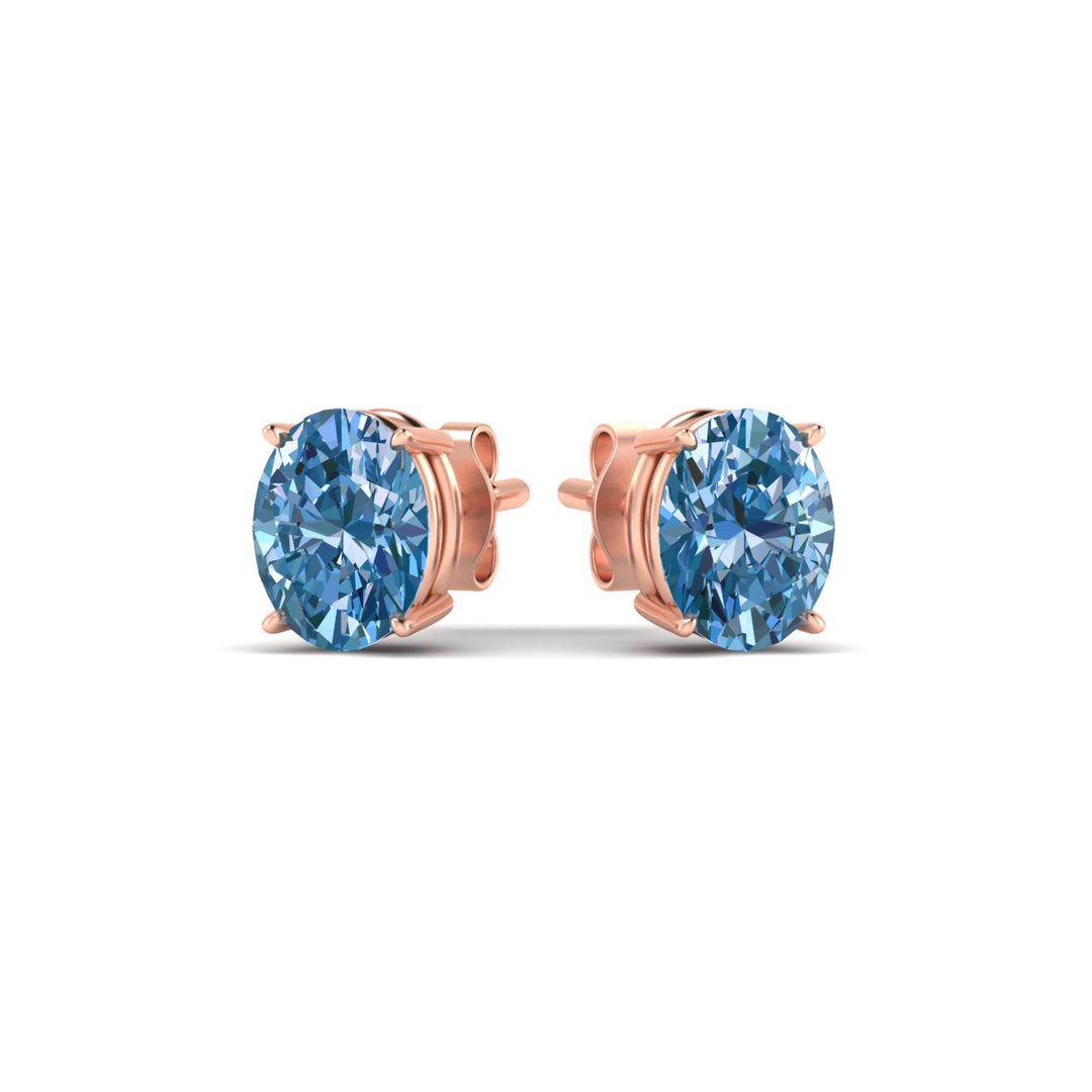 3-carat-oval-cut-vivid-blue-diamond-stud-earrings-in-rose-gold-fdear10411ovgvblueangle3-3.00ct-nl-rg.jpg