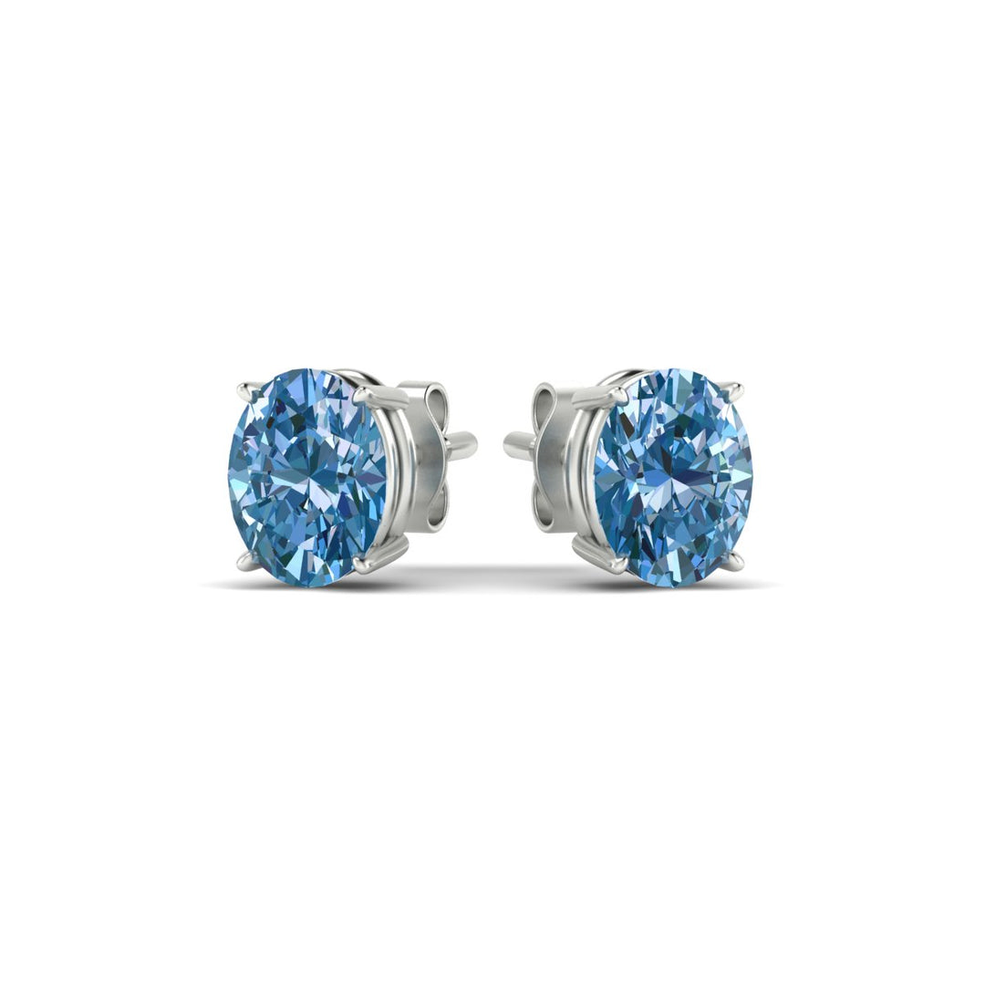 3-carat-oval-cut-vivid-blue-diamond-stud-earrings-in-white-gold-fdear10411ovgvblueangle3-3.00ct-nl-wg.jpg