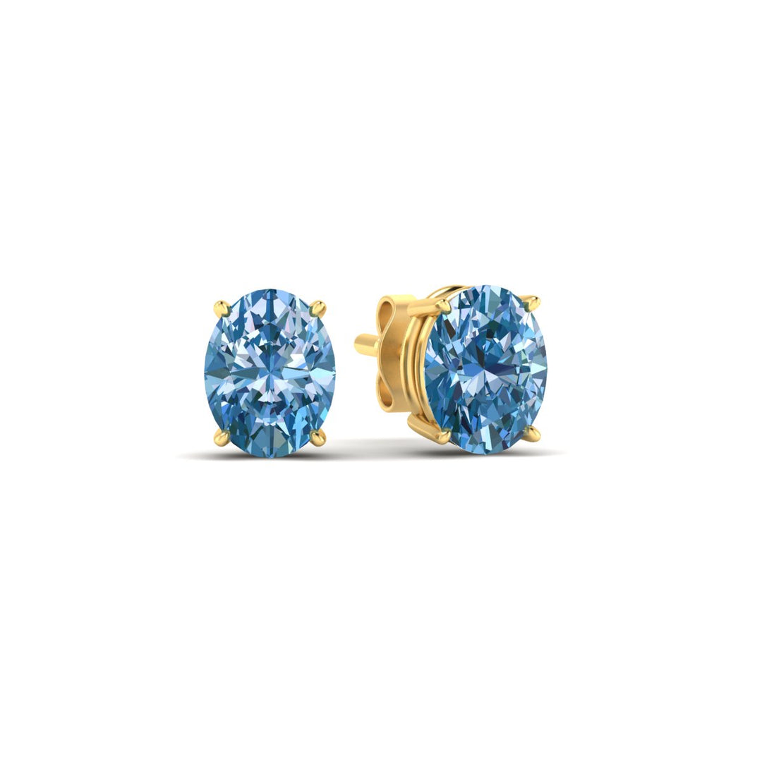 3-carat-oval-cut-vivid-blue-diamond-stud-earrings-in-yellow-gold-fdear10411ovgvblueangle1-3.00ct-nl-yg.jpg