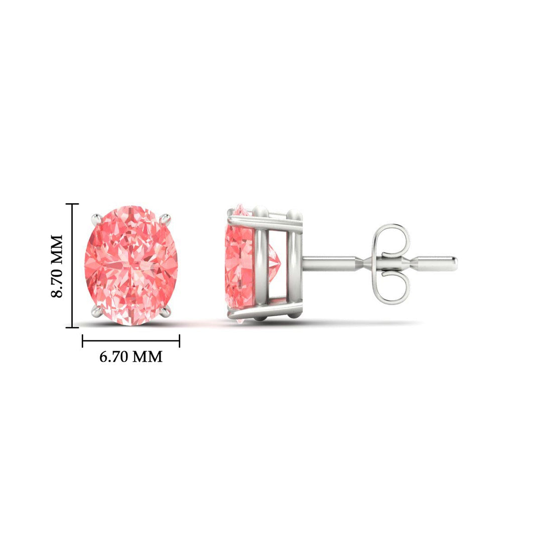 3-carat-oval-cut-vivid-pink-diamond-stud-earrings-in-white-gold-fdear10411ovgvpinkangle2-3.00ct-nl-wg-hw.jpg