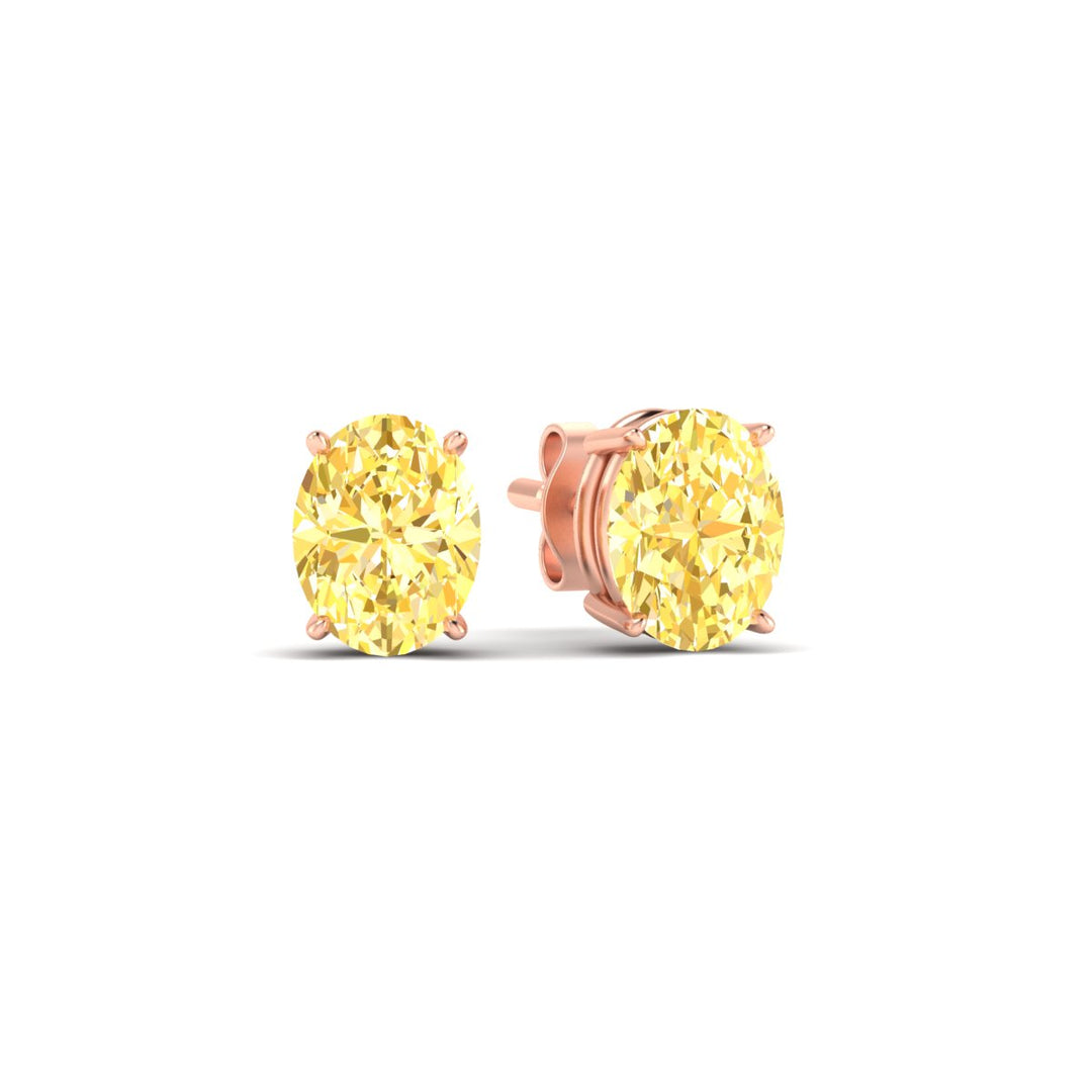 3-carat-oval-cut-vivid-yellow-diamond-stud-earrings-in-rose-gold-fdear10411ovgvyellowangle1-3.00ct-nl-rg.jpg