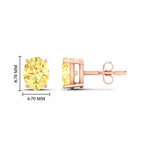 Load image into Gallery viewer, 3-carat-oval-cut-vivid-yellow-diamond-stud-earrings-in-rose-gold-fdear10411ovgvyellowangle2-3.00ct-nl-rg-hw.jpg