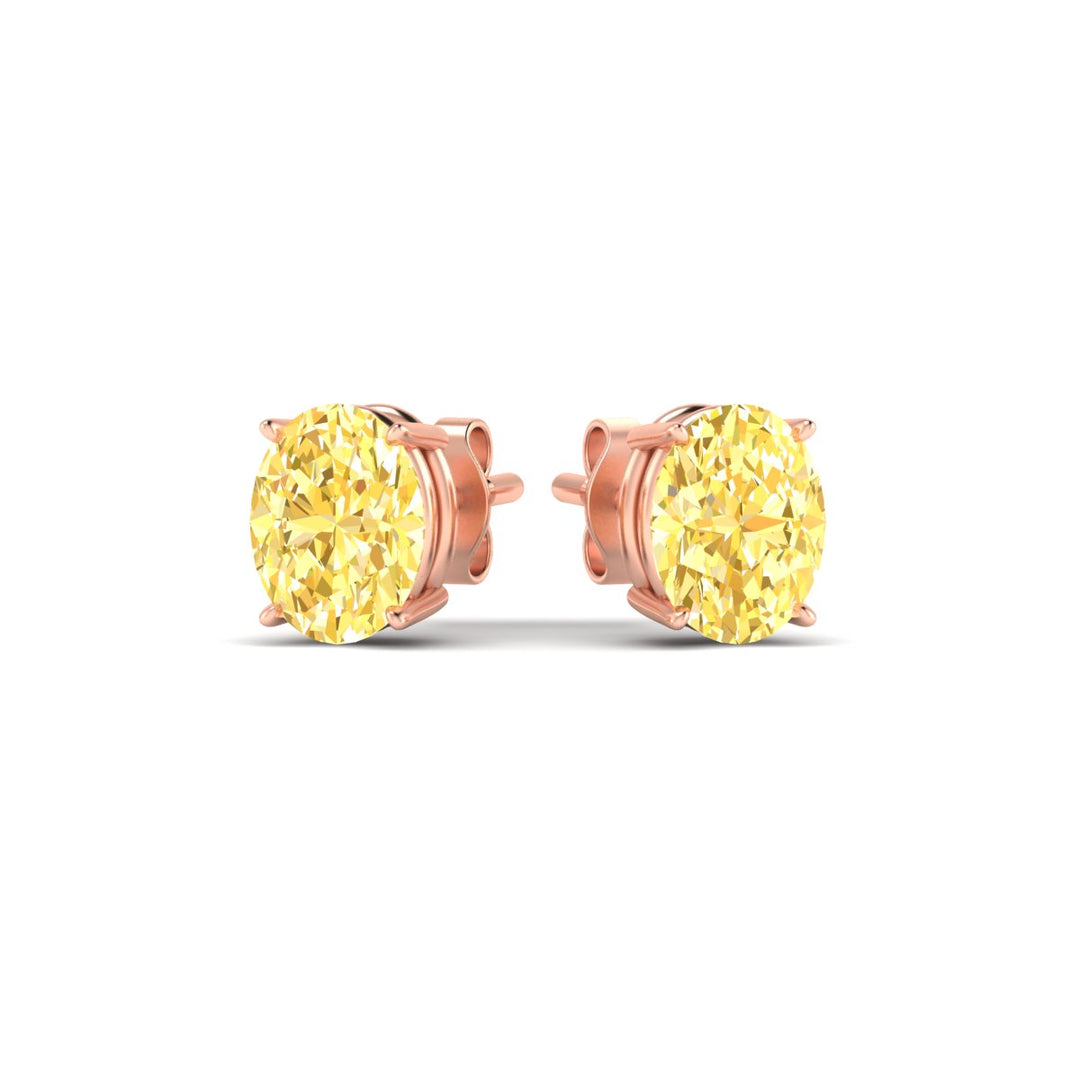 3-carat-oval-cut-vivid-yellow-diamond-stud-earrings-in-rose-gold-fdear10411ovgvyellowangle3-3.00ct-nl-rg.jpg