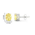 Load image into Gallery viewer, 3-carat-oval-cut-vivid-yellow-diamond-stud-earrings-in-white-gold-fdear10411ovgvyellowangle2-3.00ct-nl-wg-hw.jpg