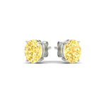 Load image into Gallery viewer, 3-carat-oval-cut-vivid-yellow-diamond-stud-earrings-in-white-gold-fdear10411ovgvyellowangle3-3.00ct-nl-wg.jpg