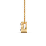 Load image into Gallery viewer, https://www.fascinatingdiamonds.com/cdn/shop/files/3-carat-round-bezel-solitaire-diamond-pendant-in-yellow-gold-fdpd10538roangle3-3-00ct-nl-yg_480x480.jpg?v=1758190848