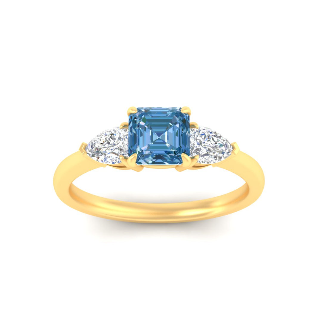 3-stone-vivid-blue-asscher-cut-cathedral-ring-in-yellow-gold-fdenr9210asgvblueangle5-nl-yg.jpg