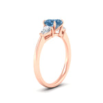 Load image into Gallery viewer, 3-stone-vivid-blue-cushion-cut-cathedral-ring-in-rose-gold-fdenr9210cugvblueangle2-nl-rg.jpg