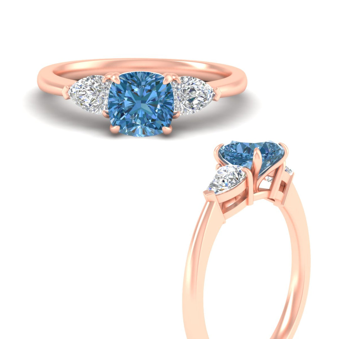 3-stone-vivid-blue-cushion-cut-cathedral-ring-in-rose-gold-fdenr9210cugvblueangle3-nl-rg.jpg
