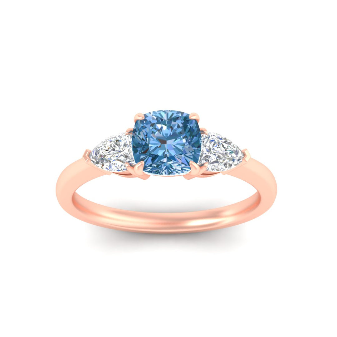 3-stone-vivid-blue-cushion-cut-cathedral-ring-in-rose-gold-fdenr9210cugvblueangle5-nl-rg.jpg