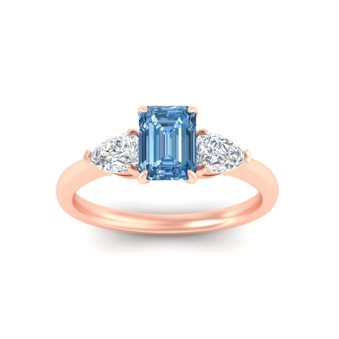 3-stone-vivid-blue-emerald-cut-cathedral-ring-in-rose-gold-fdenr9210emgvblueangle5-nl-rg.jpg