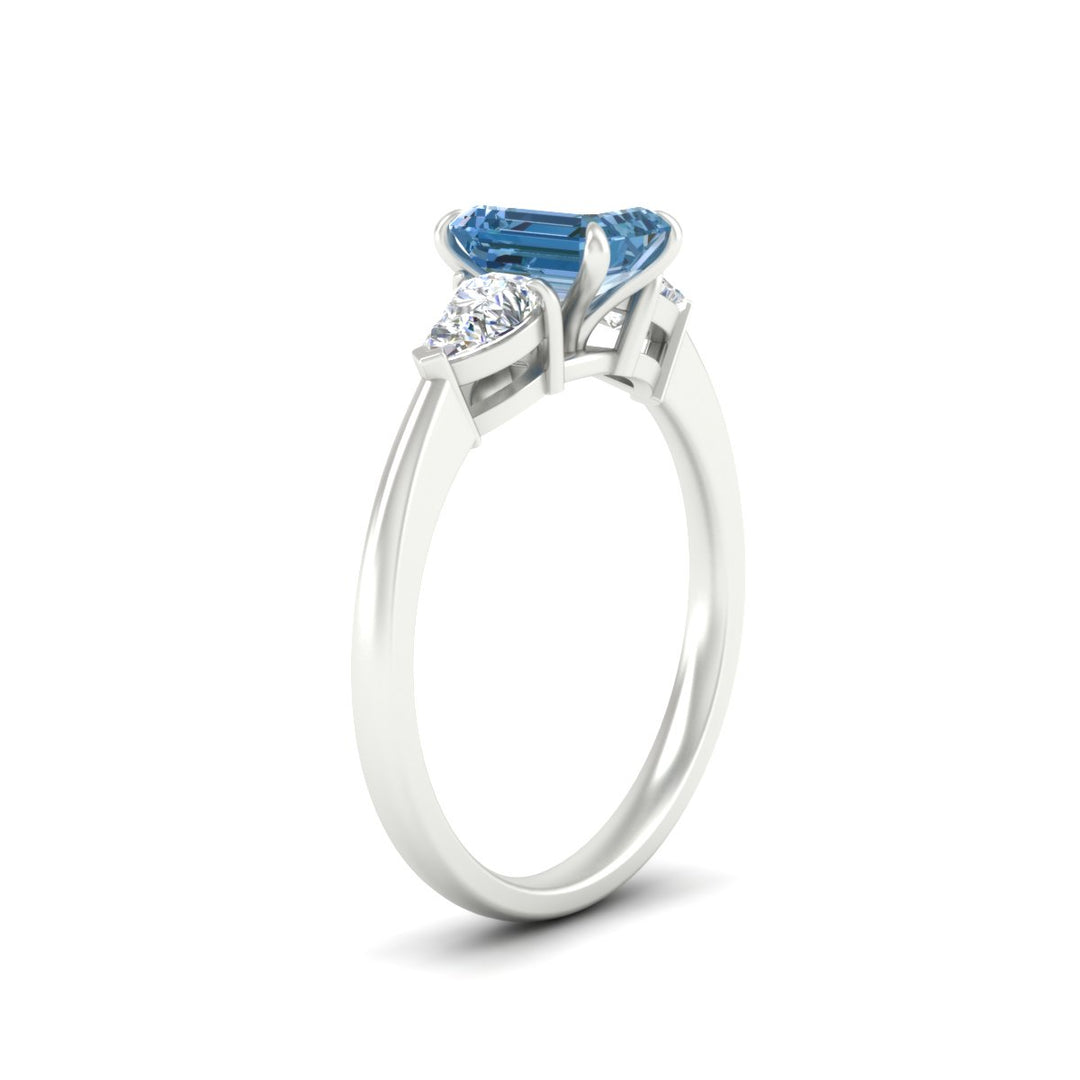 3-stone-vivid-blue-emerald-cut-cathedral-ring-in-white-gold-fdenr9210emgvblueangle2-nl-wg.jpg