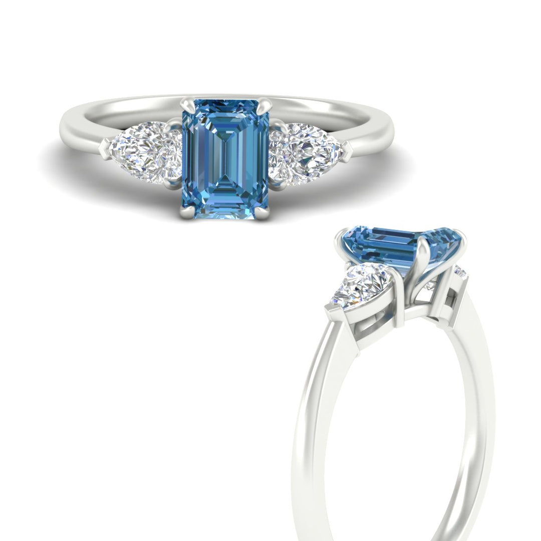 3-stone-vivid-blue-emerald-cut-cathedral-ring-in-white-gold-fdenr9210emgvblueangle3-nl-wg.jpg