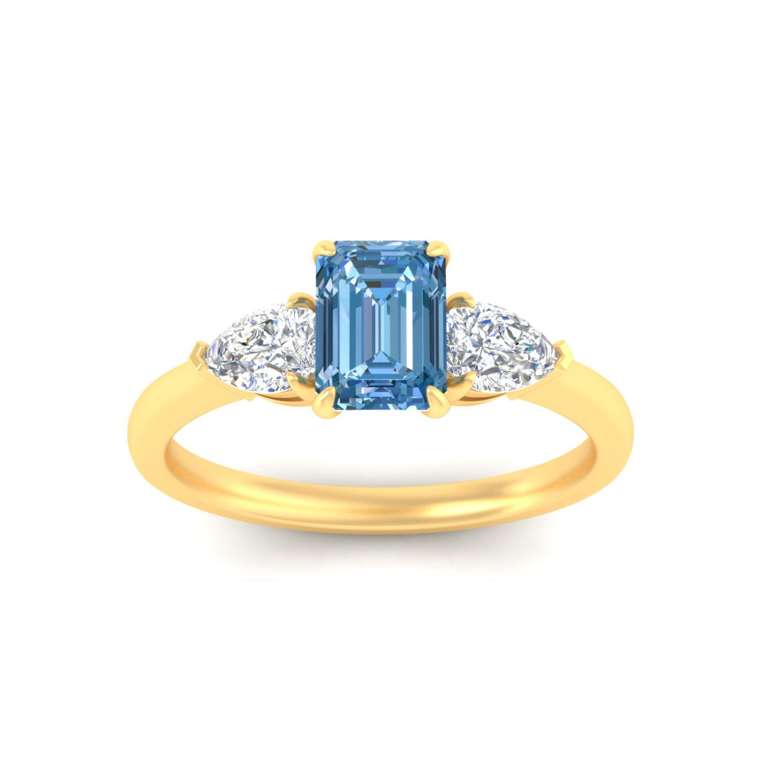 3-stone-vivid-blue-emerald-cut-cathedral-ring-in-yellow-gold-fdenr9210emgvblueangle5-nl-yg.jpg