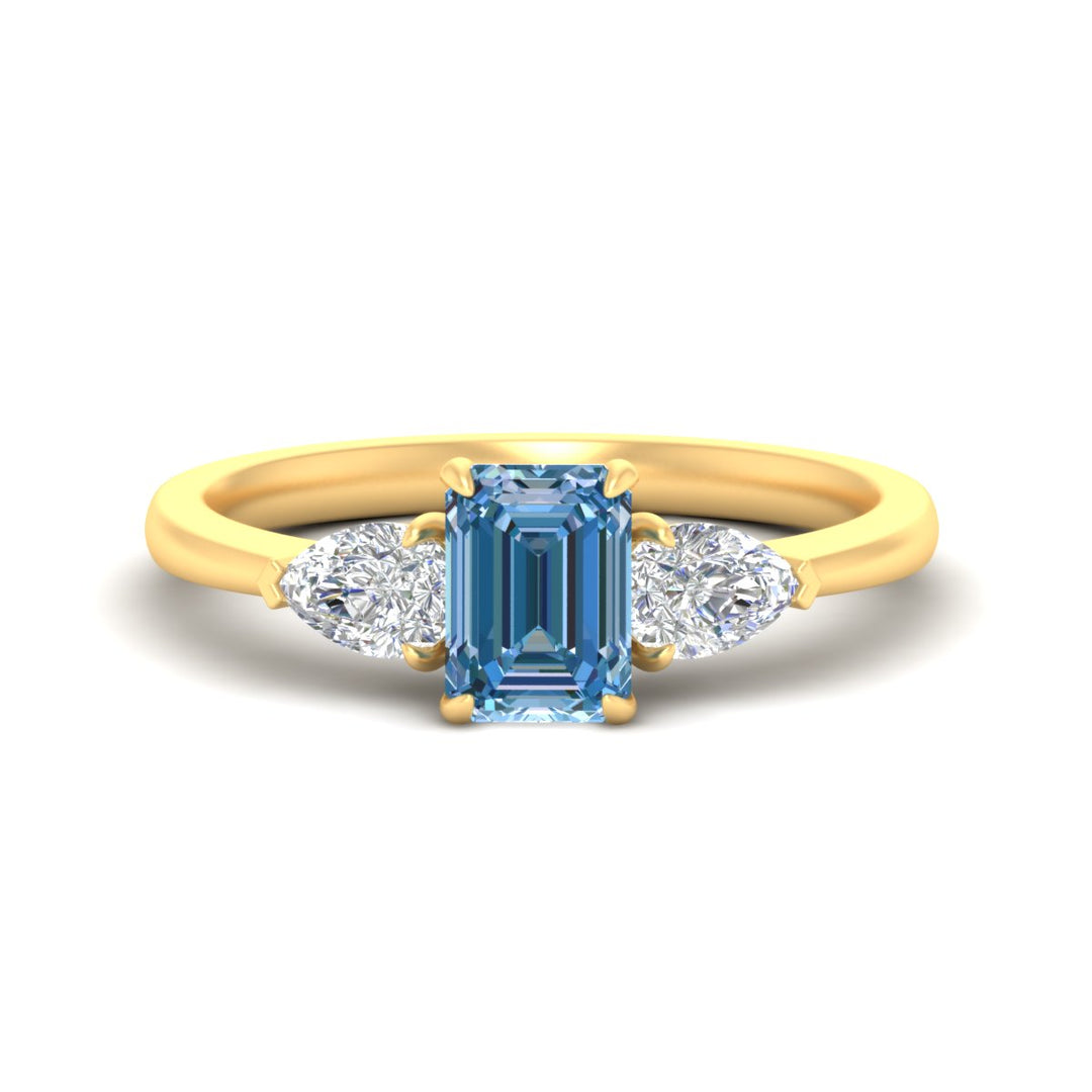 3-stone-vivid-blue-emerald-cut-cathedral-ring-in-yellow-gold-fdenr9210emgvbluesleep-nl-yg.jpg