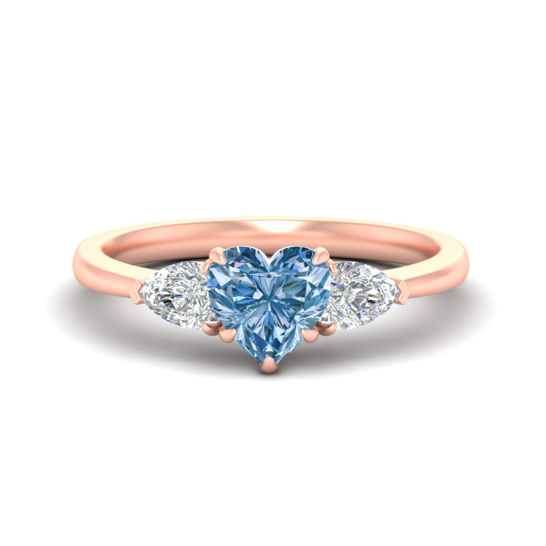 3-stone-vivid-blue-heart-shaped-cathedral-ring-in-rose-gold-fdenr9210htgvbluesleep-nl-rg.jpg