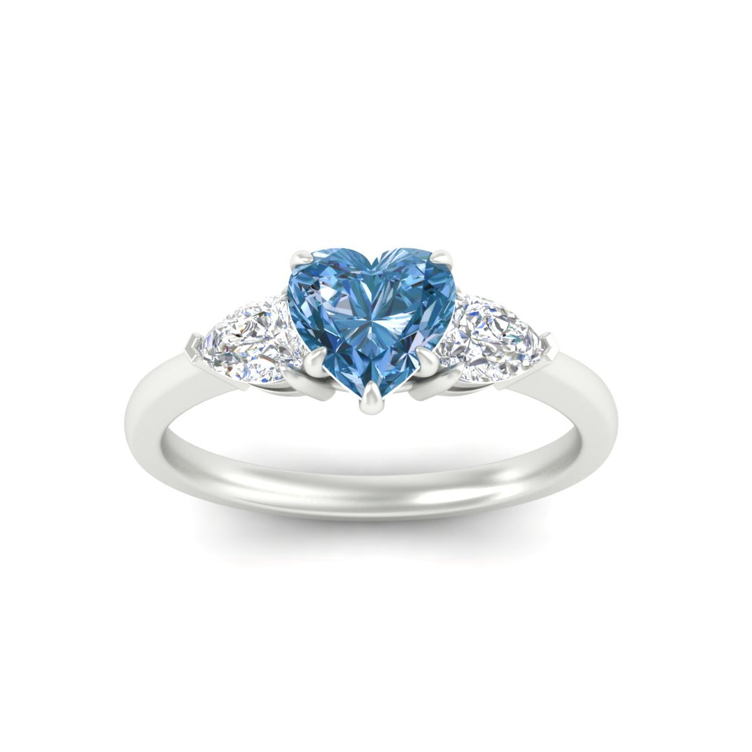 3-stone-vivid-blue-heart-shaped-cathedral-ring-in-white-gold-fdenr9210htgvblueangle5-nl-wg.jpg