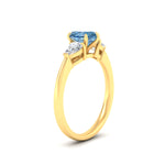 Load image into Gallery viewer, 3-stone-vivid-blue-heart-shaped-cathedral-ring-in-yellow-gold-fdenr9210htgvblueangle2-nl-yg.jpg