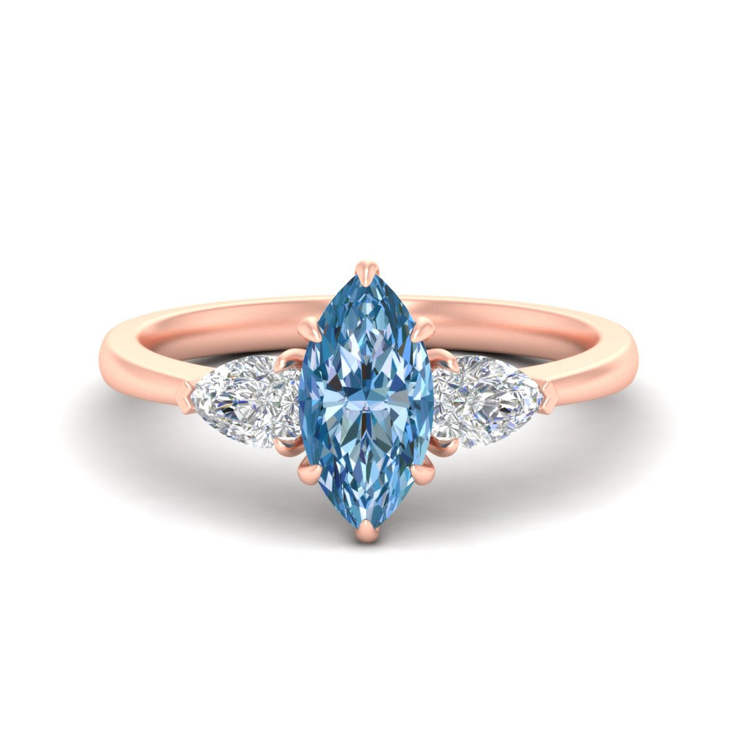3-stone-vivid-blue-marquise-cut-cathedral-ring-in-rose-gold-fdenr9210mqgvbluesleep-nl-rg.jpg