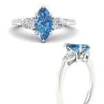 Load image into Gallery viewer, 3-stone-vivid-blue-marquise-cut-cathedral-ring-in-white-gold-fdenr9210mqgvblueangle3-nl-wg.jpg